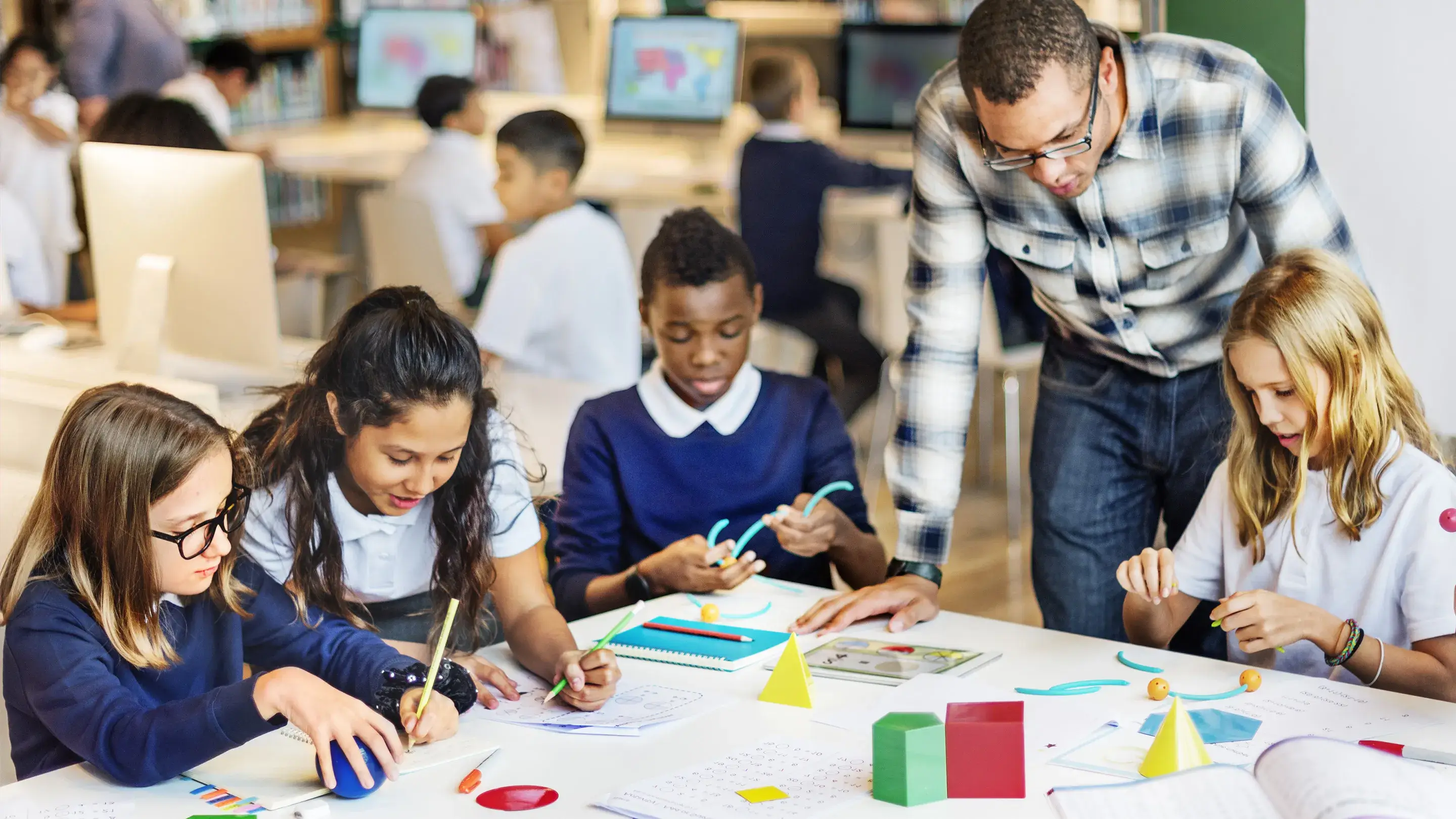 Students actively engaged in a primary classroom