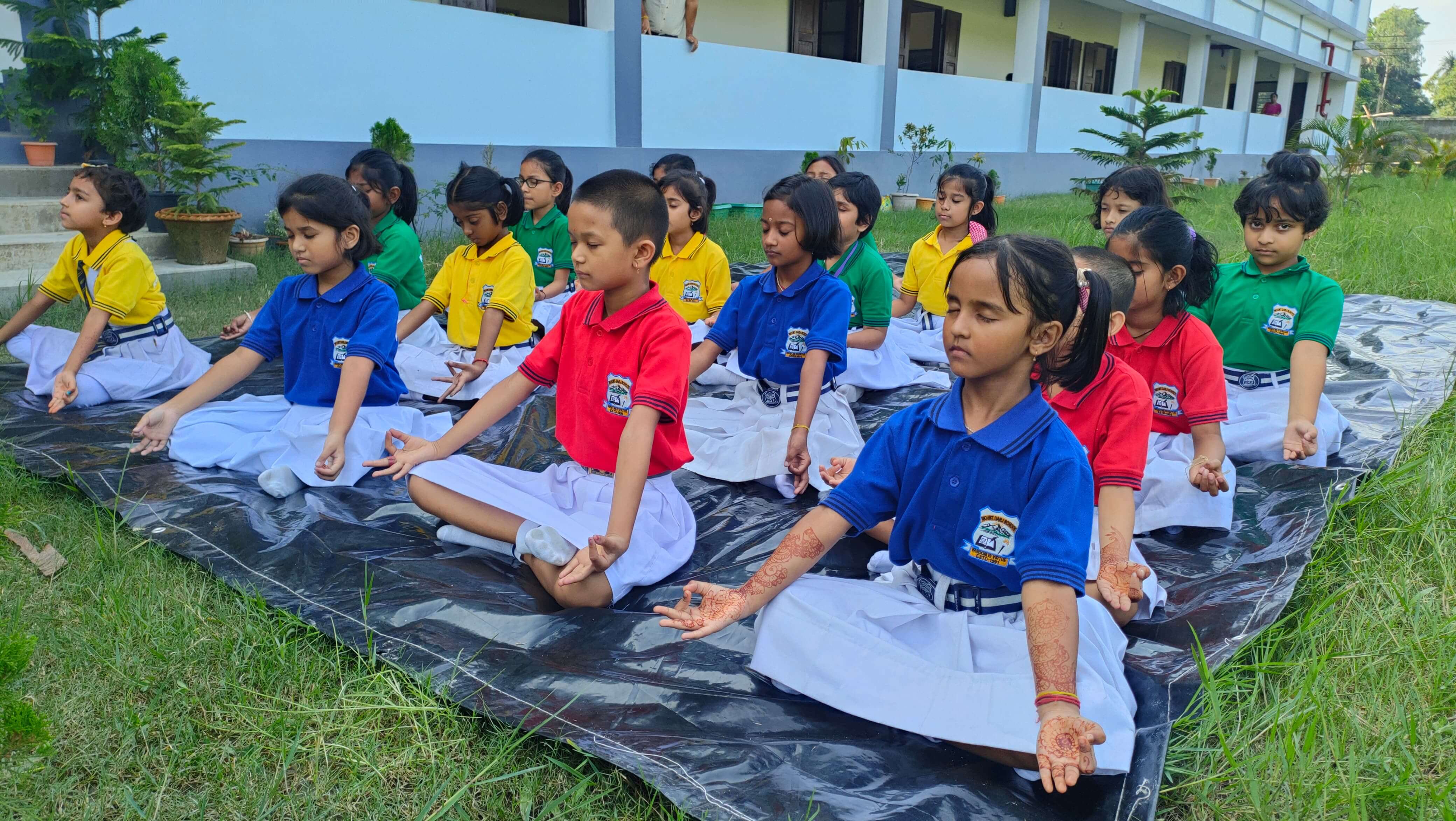 Students in prayer ground